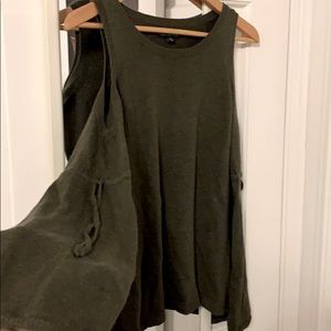 Shoulder cut-our green sweater